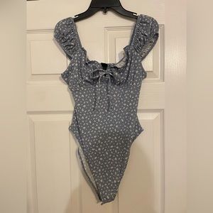 Blue and white floral bodysuit